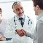 Healthcare consultant meeting with a hospital client